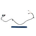 Black wiring harness with multiple connectors and a blue ruler for scale on white background.