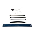 Polaris engine temperature harness kit with black connectors, wiring, and zip ties next to blue ruler.