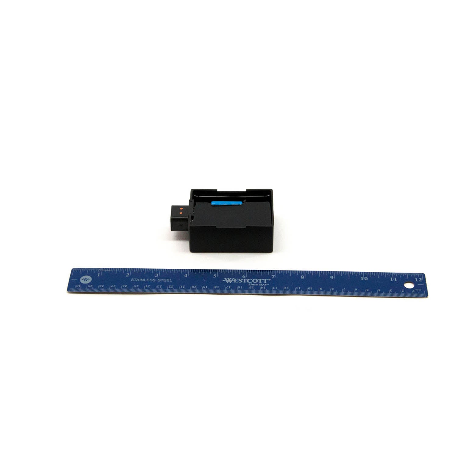 Compact black rectangular CDI ignition module with three-pin connector and blue label, shown next to a 12-inch ruler for.
