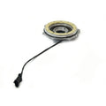 Circular black and metal Polaris output cover with attached wire and connector on white background.