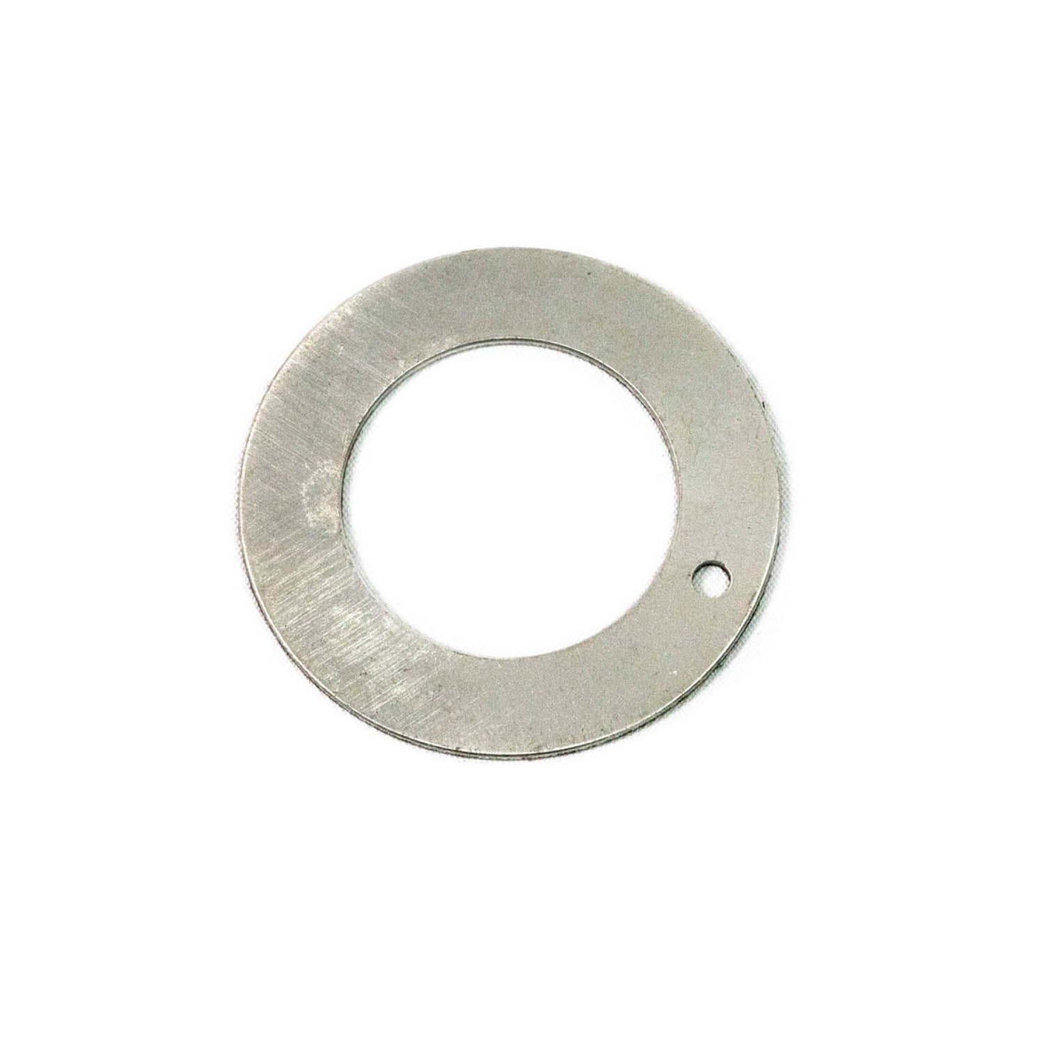 Round silver metal shim with outer and inner holes, smooth surface, small notch hole near edge.