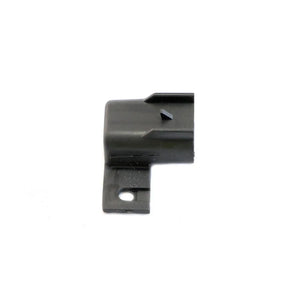 Small black plastic fuseholder cover with mounting hole and triangular notch detail.