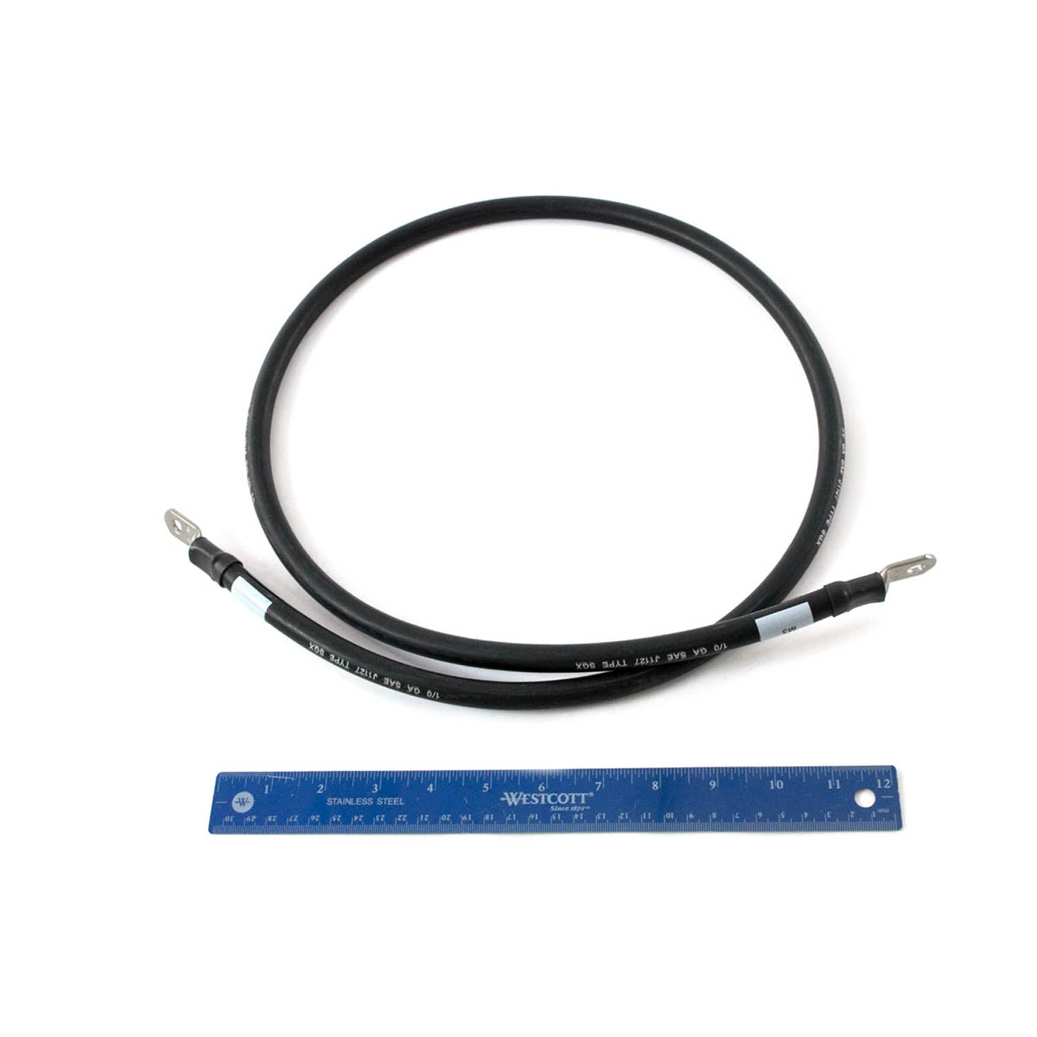 Black insulated motor cable with metal terminal connectors at both ends, displayed next to a blue 12-inch ruler for scale.