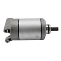 Silver cylindrical metal starter motor with black gear teeth and mounting bracket.