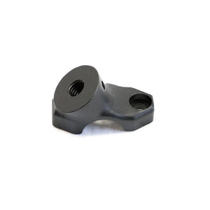 Black metal fairing bottom riser with threaded hole and mounting point, compact design.