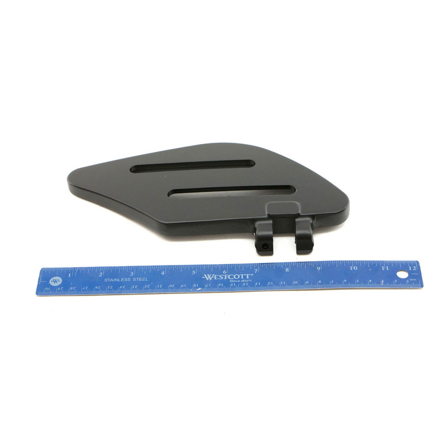 Flat black right passenger floorboard with two mounting clips and elongated slots.