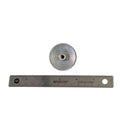Silver metal water pump impeller with central hole, placed above a 12-inch metal ruler showing size.