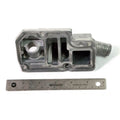 Gray metal breather cover with multiple compartments and a cylindrical outlet, shown next to a 6-inch ruler for scale.