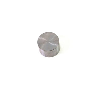 Round metallic valve tappet with smooth, polished silver surface and flat top.