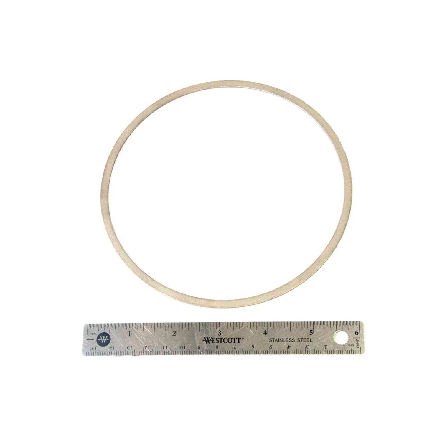 A Clutch Judder Spring Seat by Polaris is shown above a 12-inch metal ruler on a white background, demonstrating its precision with the seat's diameter measuring approximately 10 inches.