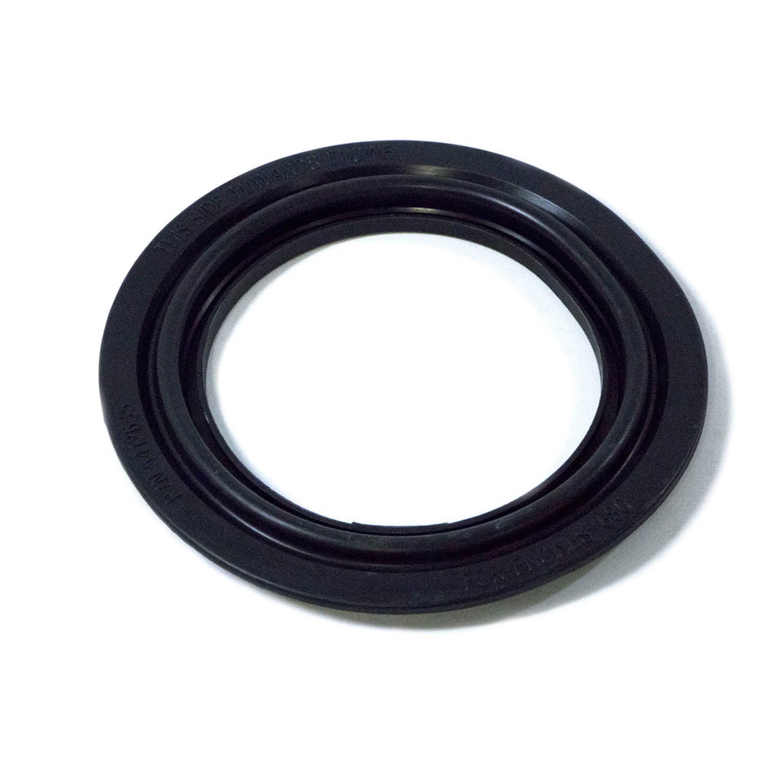 Black rubber inner clutch cover seal with smooth and grooved circular design.
