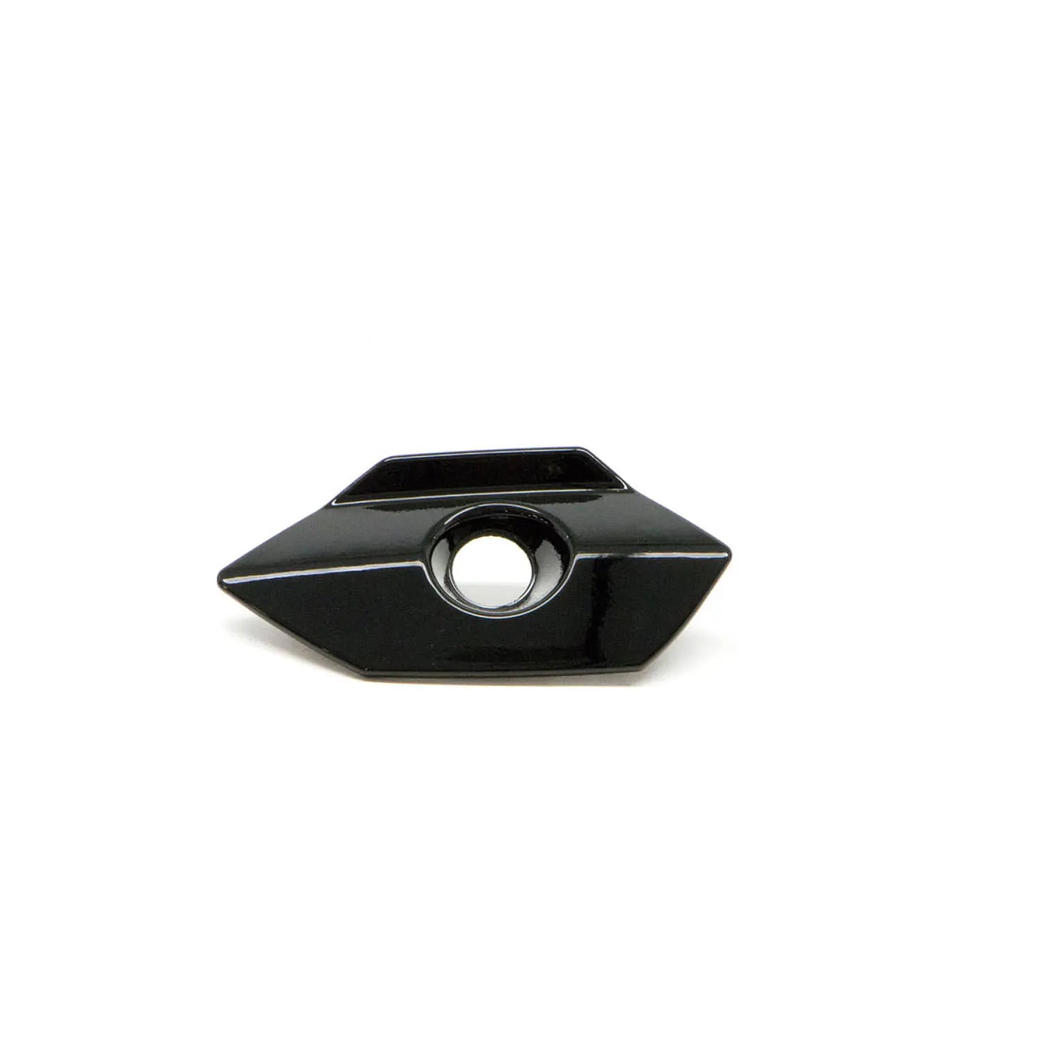 Black glossy saddlebag lock bezel with angular shape and central circular keyhole opening.