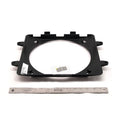 Black rectangular plastic fan shroud with central circular opening and mounting tabs, shown with metal ruler for scale.