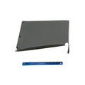 Black rear inner fender panel with smooth matte finish and mounting holes, accompanied by blue ruler for scale.
