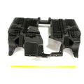 Gloss black molded plastic lower floor panel with textured grip areas and mounting points for Polaris UTV models.