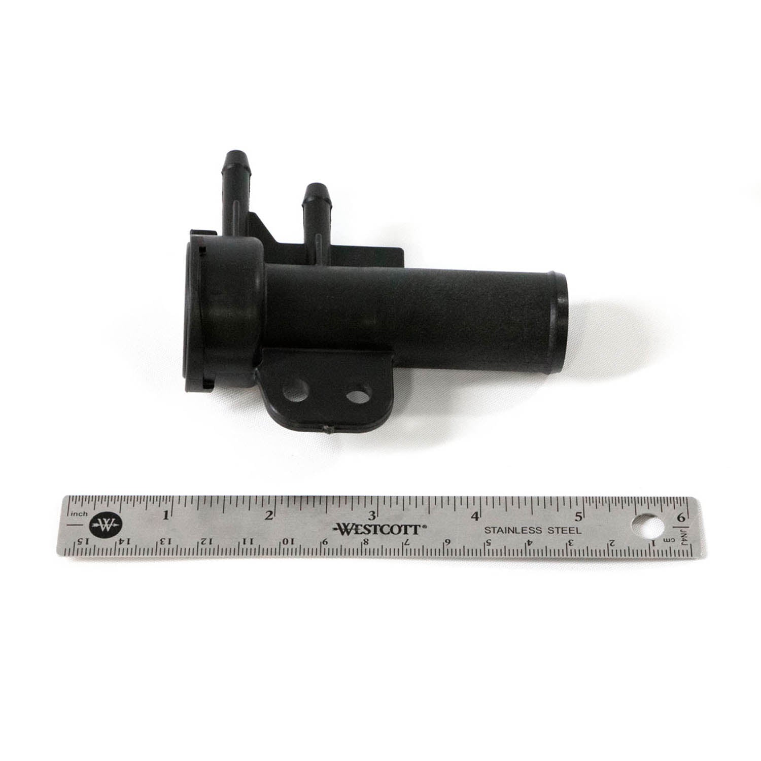 Black cylindrical coolant remote filler with mounting bracket and dual hose connectors, about 5 inches long.