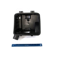 Black rectangular plastic engine intake boot with angled outlet and mounting tabs, shown with blue ruler for scale.