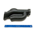 Black molded plastic airbox intake duct with curved tubular design and sealing cap, next to blue ruler for scale.