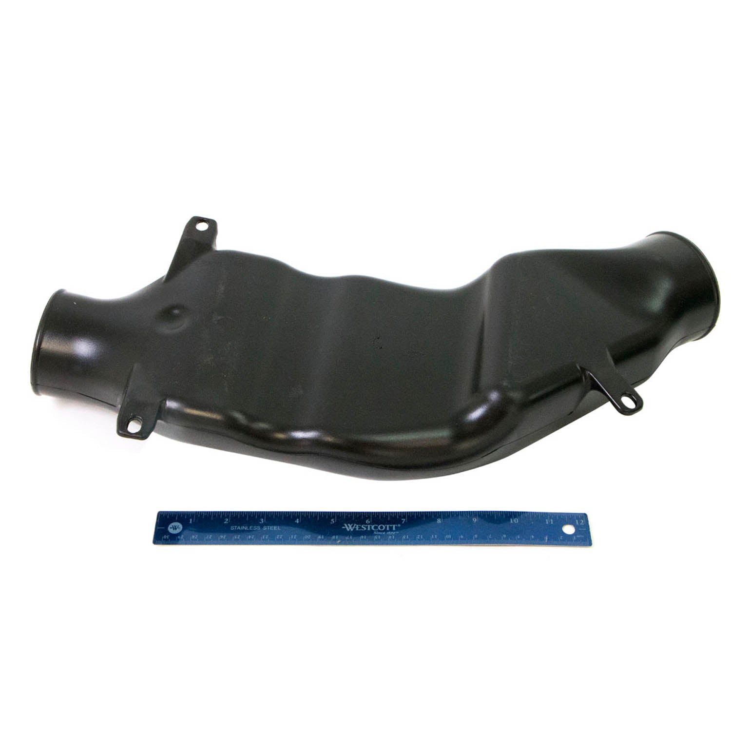 Black molded plastic outlet duct clutch mudder with mounting tabs and smooth curved design, shown with blue ruler for scale.