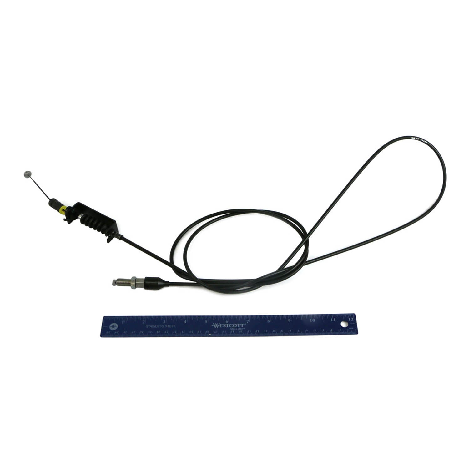Black throttle cable with metal connectors and yellow plastic clip, laid next to a blue 12-inch ruler.