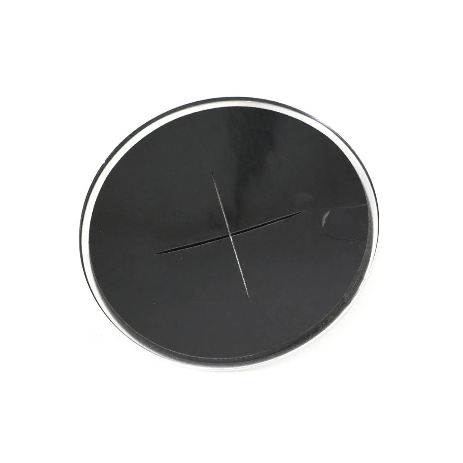 The Airbox Cover Cap Chrome by Polaris is a round black grommet with a chrome-like silver outer ring and a cross-shaped center slit, designed for organizing cables through desks or tables, reminiscent of OEM Indian Polaris parts.