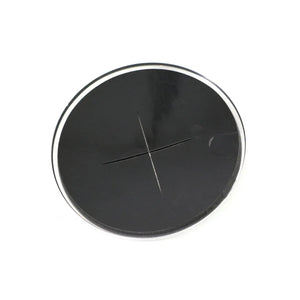 The Airbox Cover Cap Chrome by Polaris is a round black grommet with a chrome-like silver outer ring and a cross-shaped center slit, designed for organizing cables through desks or tables, reminiscent of OEM Indian Polaris parts.