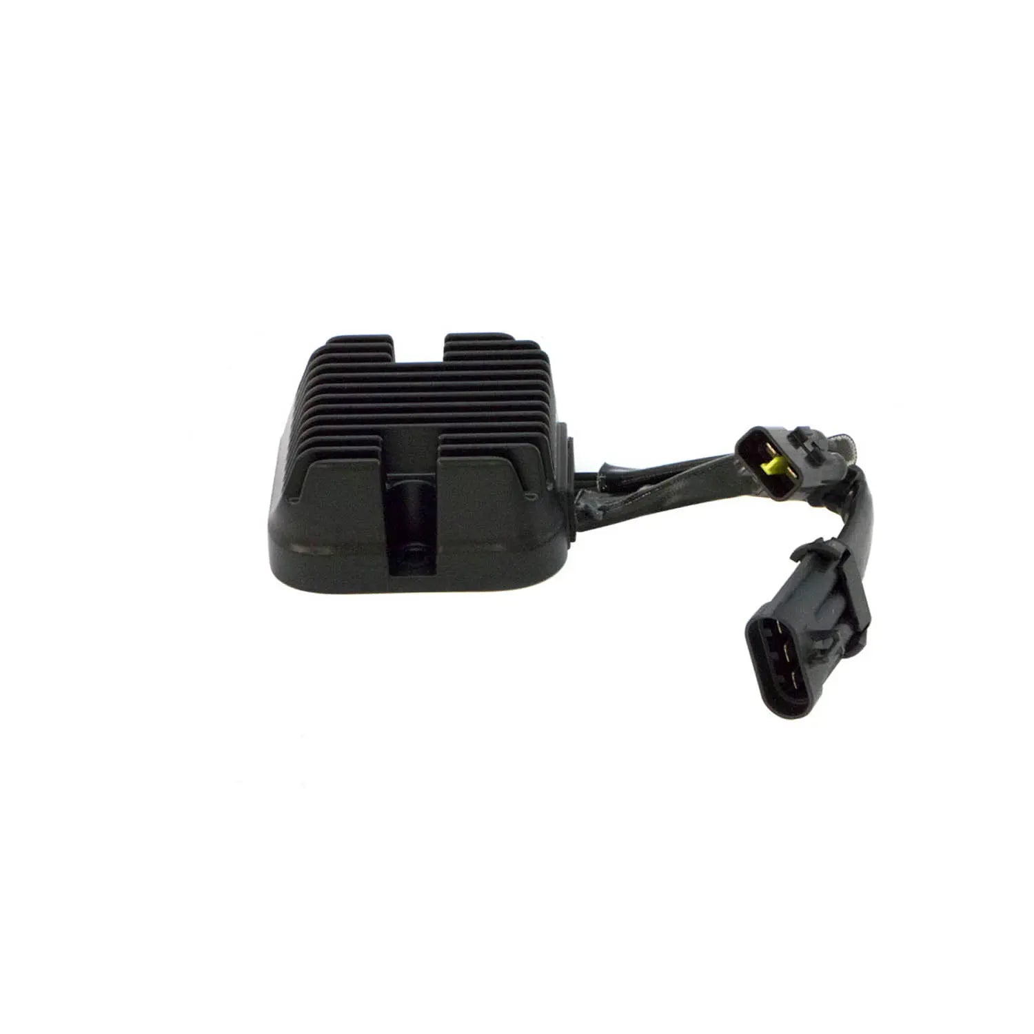 Black rectangular motorcycle voltage rectifier with cooling fins and attached wiring harness connectors.
