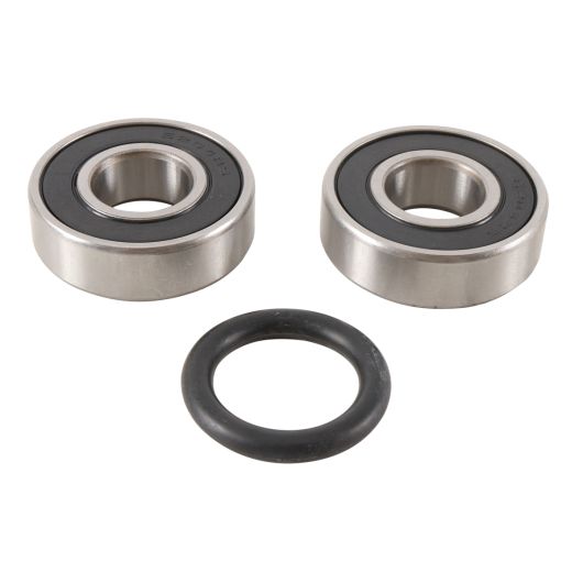Two silver metal sealed ball bearings and one black rubber seal ring for motorcycle wheel maintenance.