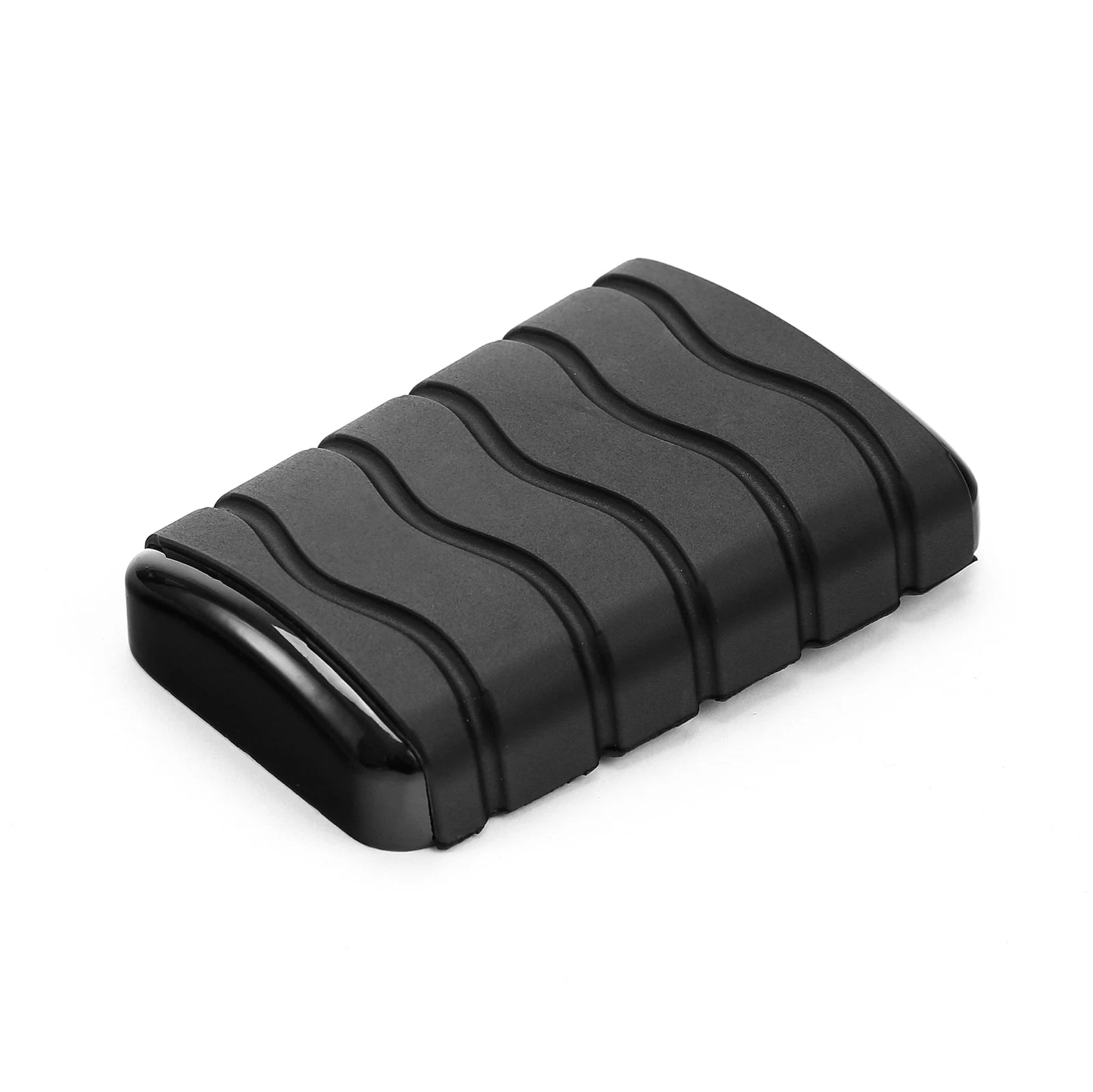 A black, rectangular Adjustable Foot Rest Kit Anti Vibration Style by Witchdoctors with a wavy textured surface and glossy curved edge—shown on a white background—perfect for enhancing motorcycle comfort.