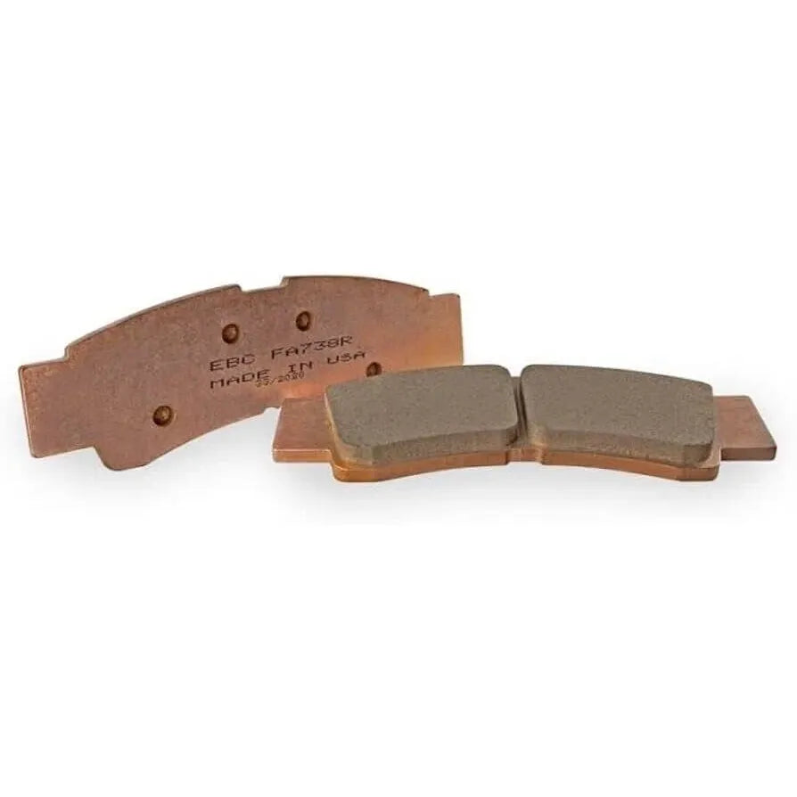 Set of two brown sintered brake pads with rectangular friction surfaces and metal backing plates designed for off-road use.